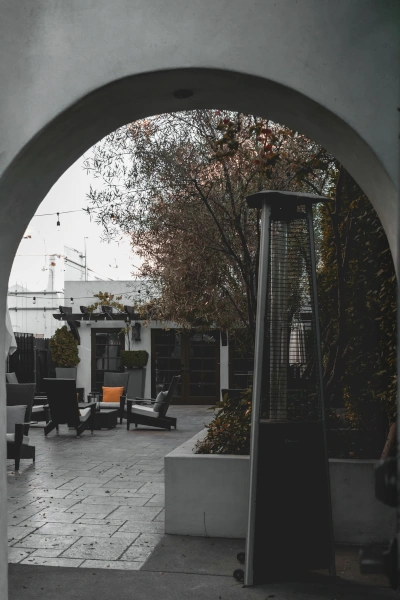 Outdoor seating with heat lamp.